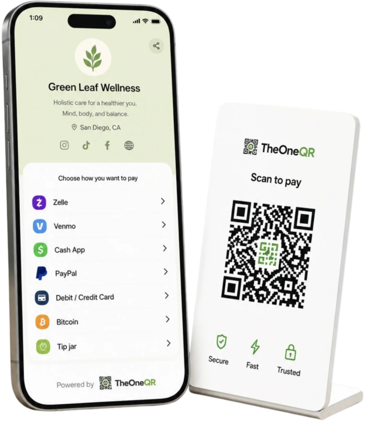 TheOneQR merchant page on iPhone next to a countertop QR stand